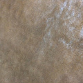 Дубленочный мех коричневый производства Россия с покрытием &quot;Лазер&quot;. Вид на покрытие.