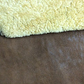 Дубленочный мех коричневый производства Россия с покрытием &quot;Лазер&quot;. Вид на покрытие и мех.